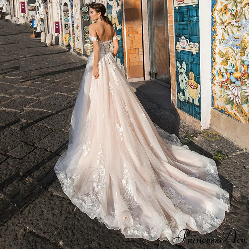 Airy Lace Extended Train Wedding Gown