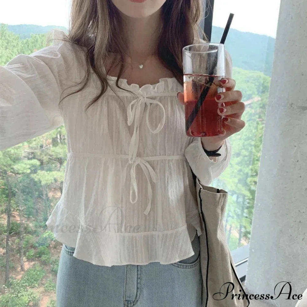 Antique Baggy Ivory Frilled Extended Sleeve Top