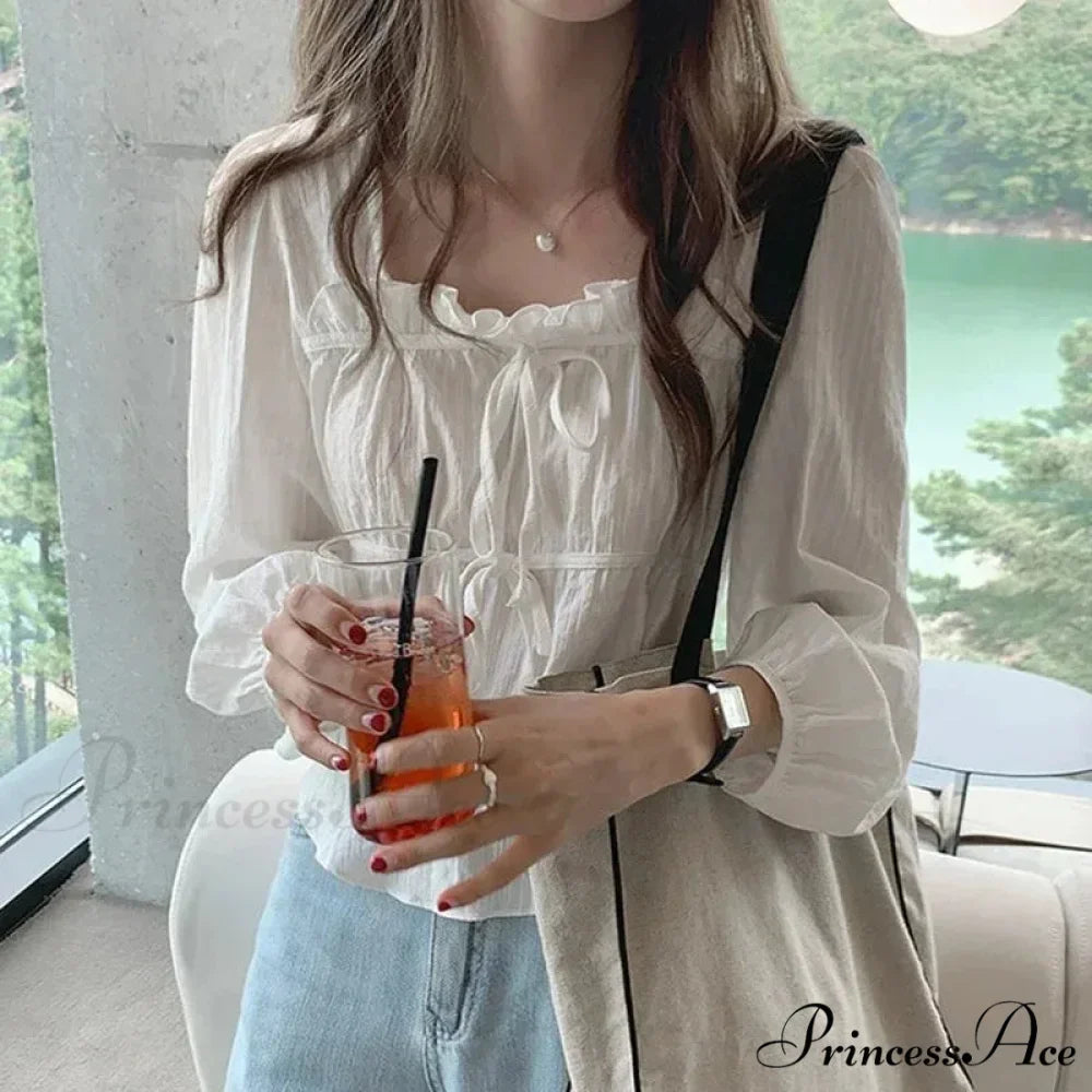 Antique Baggy Ivory Frilled Extended Sleeve Top