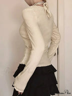 Bow Patchwork Lace Trim Halter V-Neck Long Sleeve Knit TopModified Title: Ribbon Patchwork Lace Trim Halter V-Neck Long Sleeve Knit Top