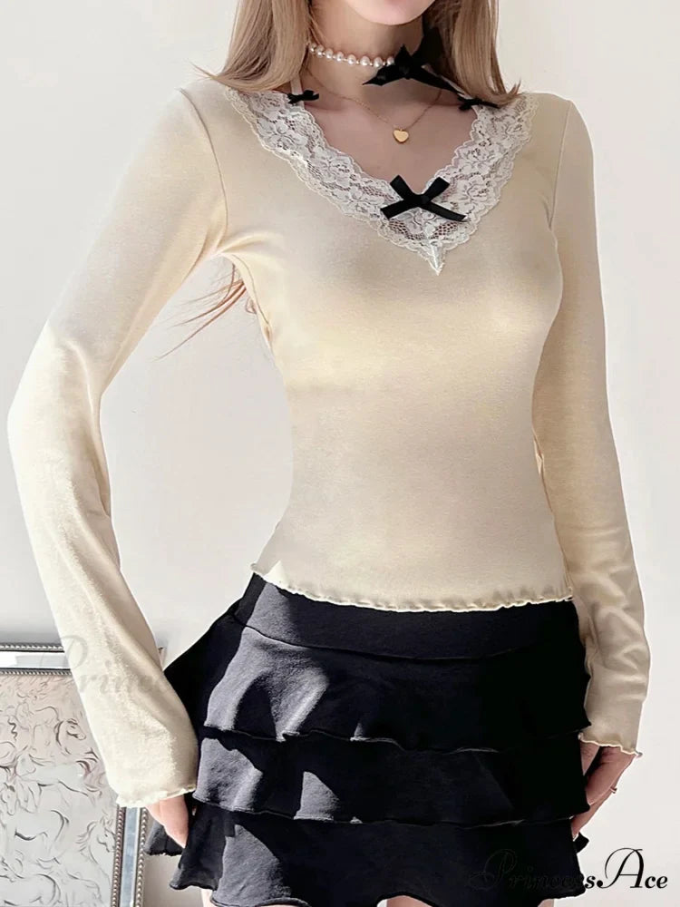 Bow Patchwork Lace Trim Halter V-Neck Long Sleeve Knit TopModified Title: Ribbon Patchwork Lace Trim Halter V-Neck Long Sleeve Knit Top