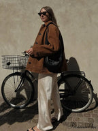 Brown Stand Collar Suede CoatModified Output: Tan Upright Neck Suede Jacket