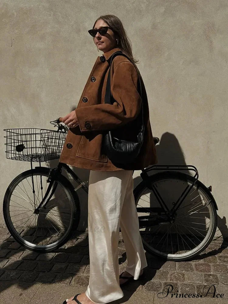 Brown Stand Collar Suede CoatModified Output: Tan Upright Neck Suede Jacket