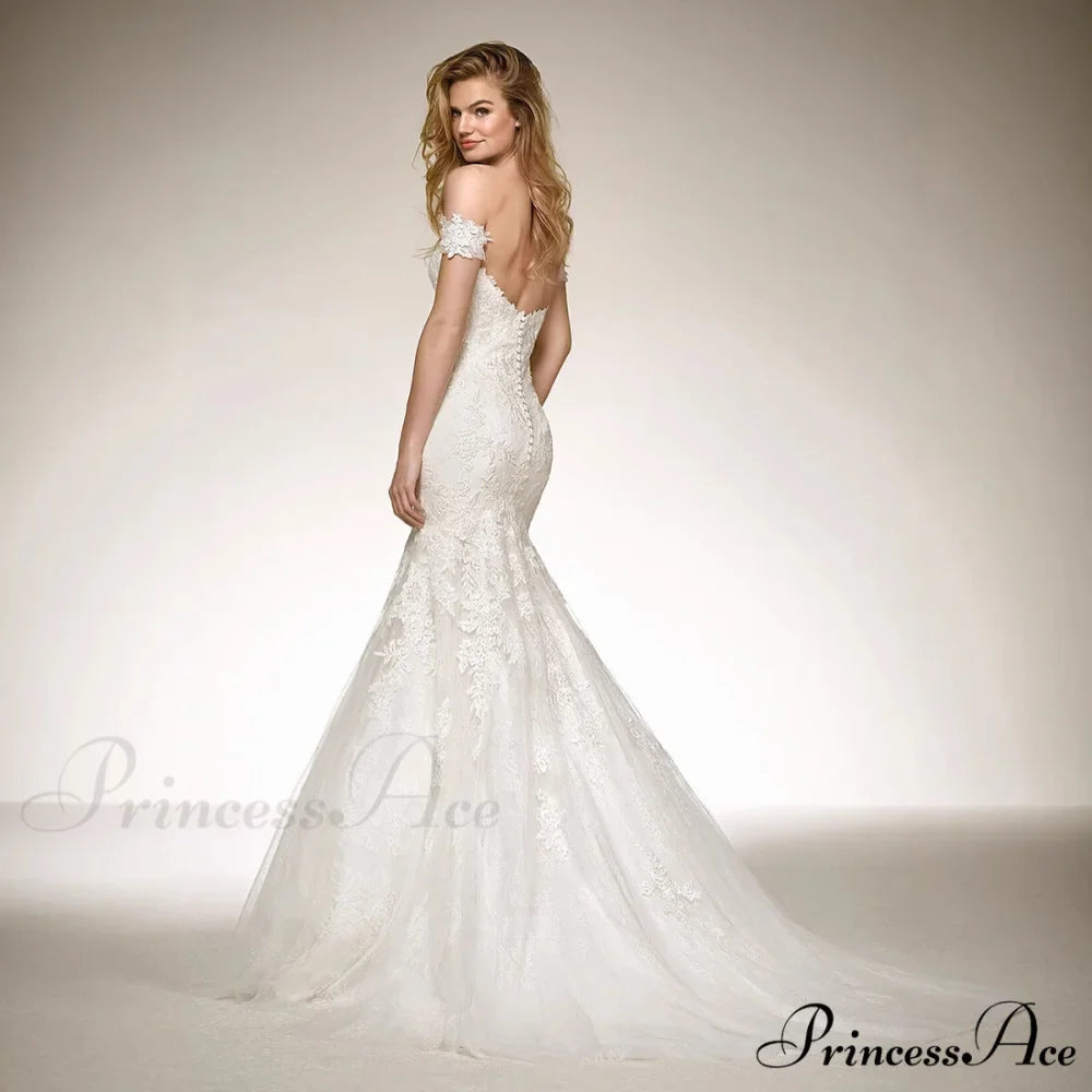 Deep Neck Extended Train Transparent Wedding Gown