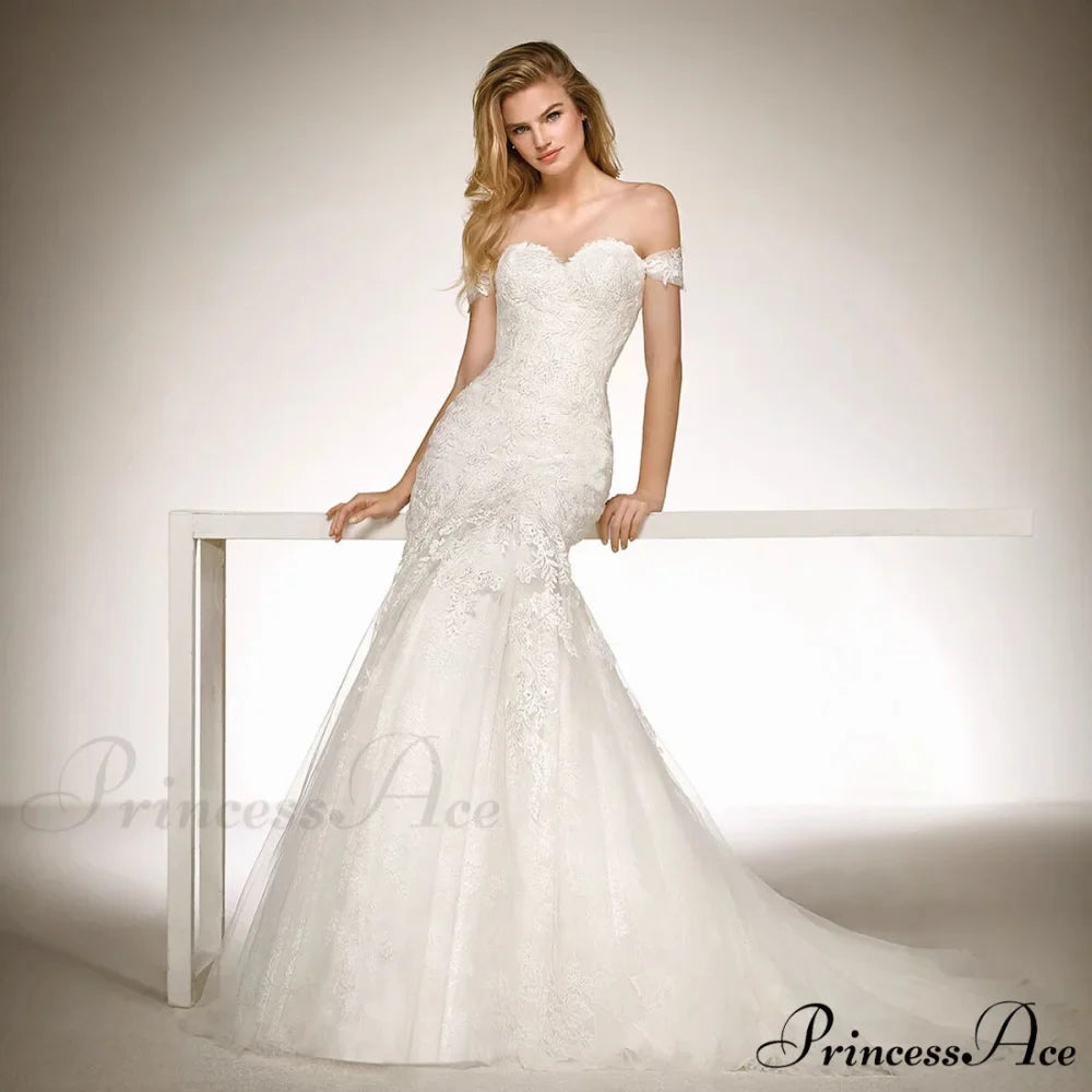 Deep Neck Extended Train Transparent Wedding Gown