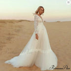 Deep Plunge Neckline Extended Sleeve Lace Bridal Gown