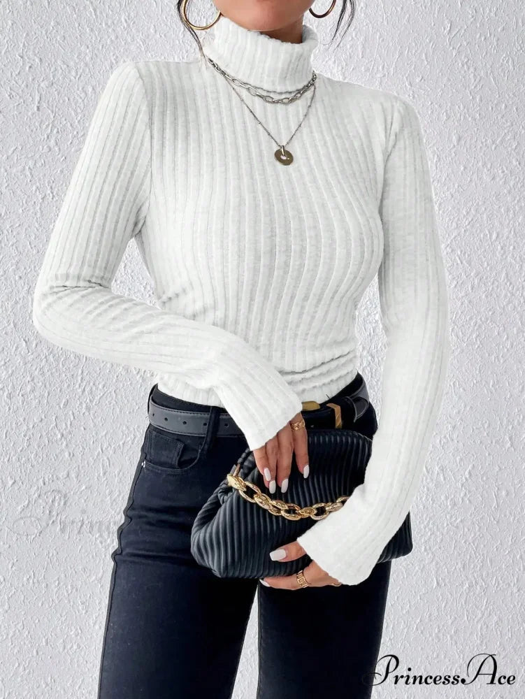Dynamic Monochromatic High-Collar Trim-Fit Long Sleeve Top Women