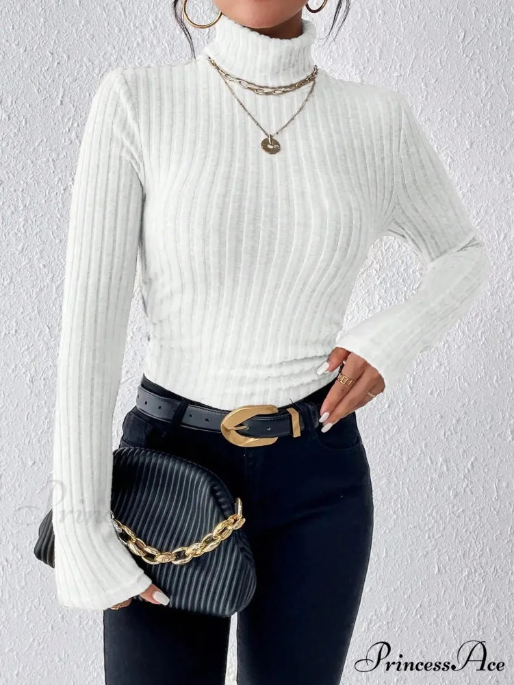 Dynamic Monochromatic High-Collar Trim-Fit Long Sleeve Top Women