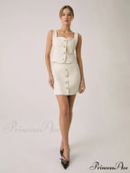 Elegant Pearl Graceful Buckle Mini Skirt