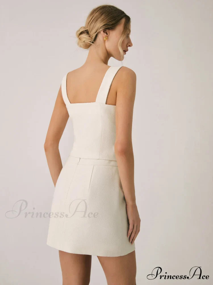 Elegant Pearl Graceful Buckle Mini Skirt