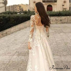 Extended Sleeve Open-Back Bridal Gown