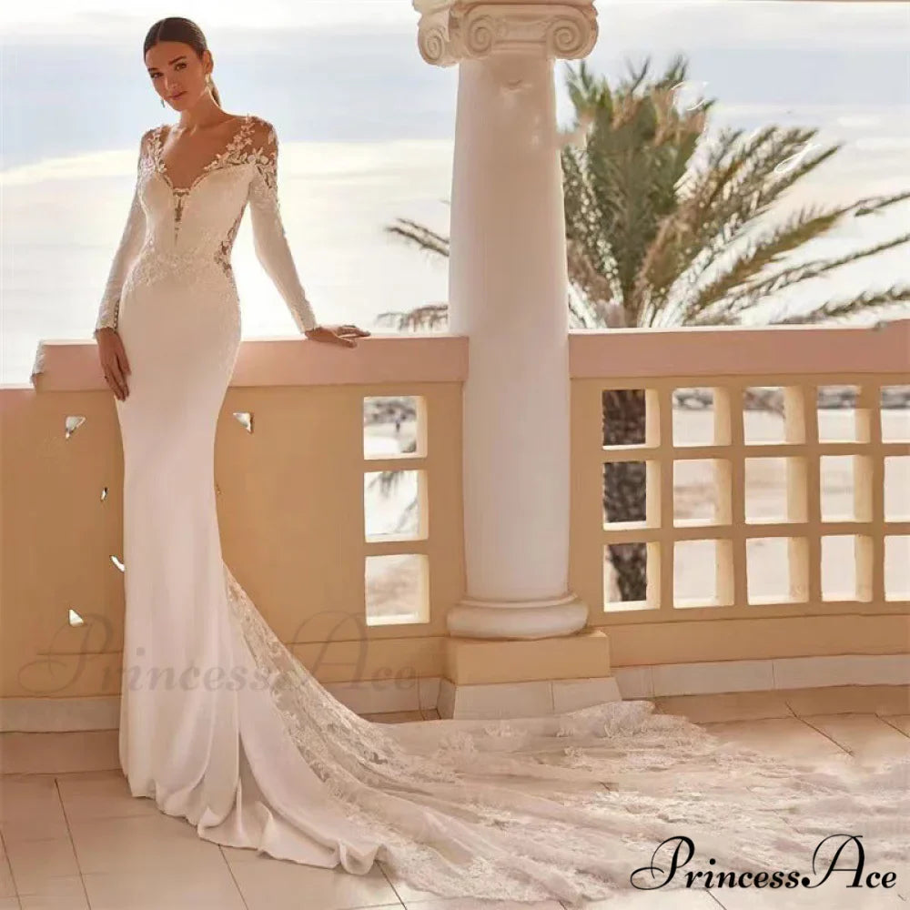 Extended Sleeve Stitched Seaside Wedding Gown