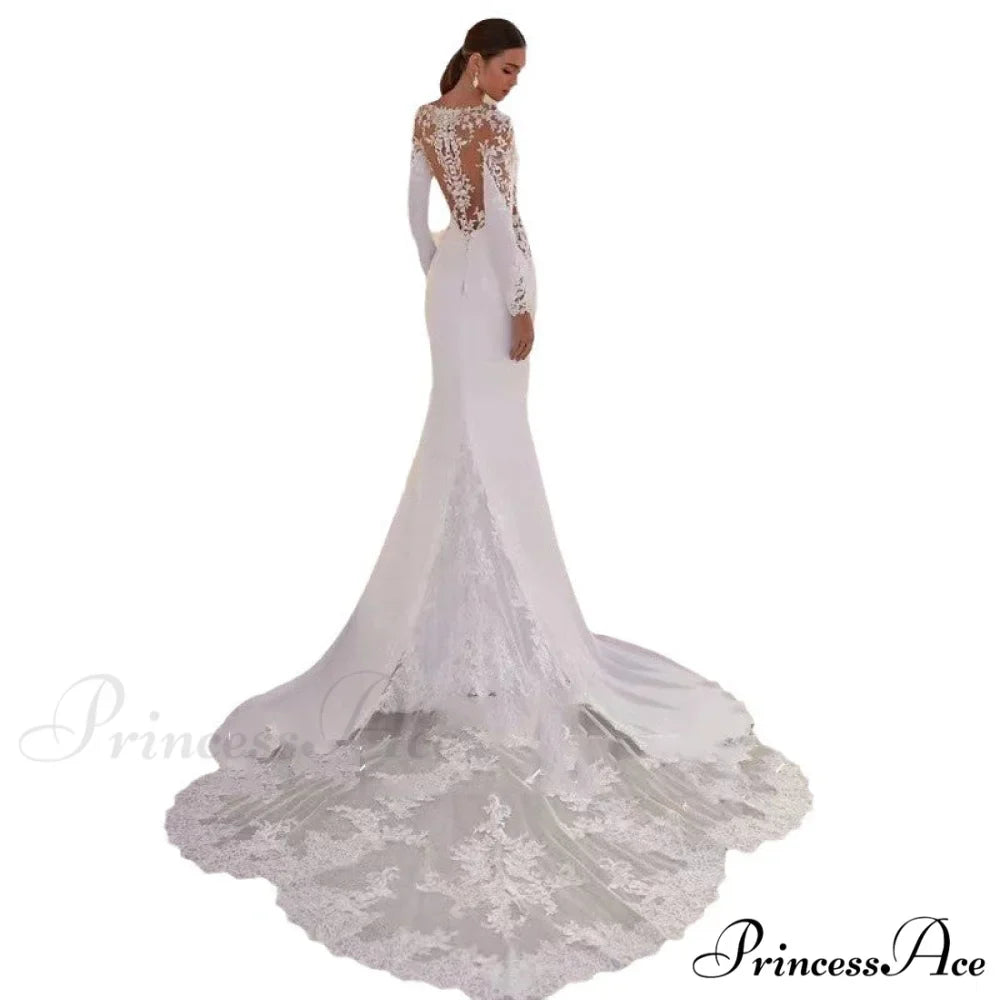 Extended Sleeve Stitched Seaside Wedding Gown