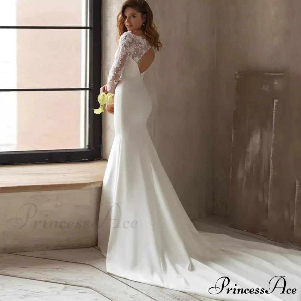 Extended Sleeve U-Shaped Mermaid Wedding Gown