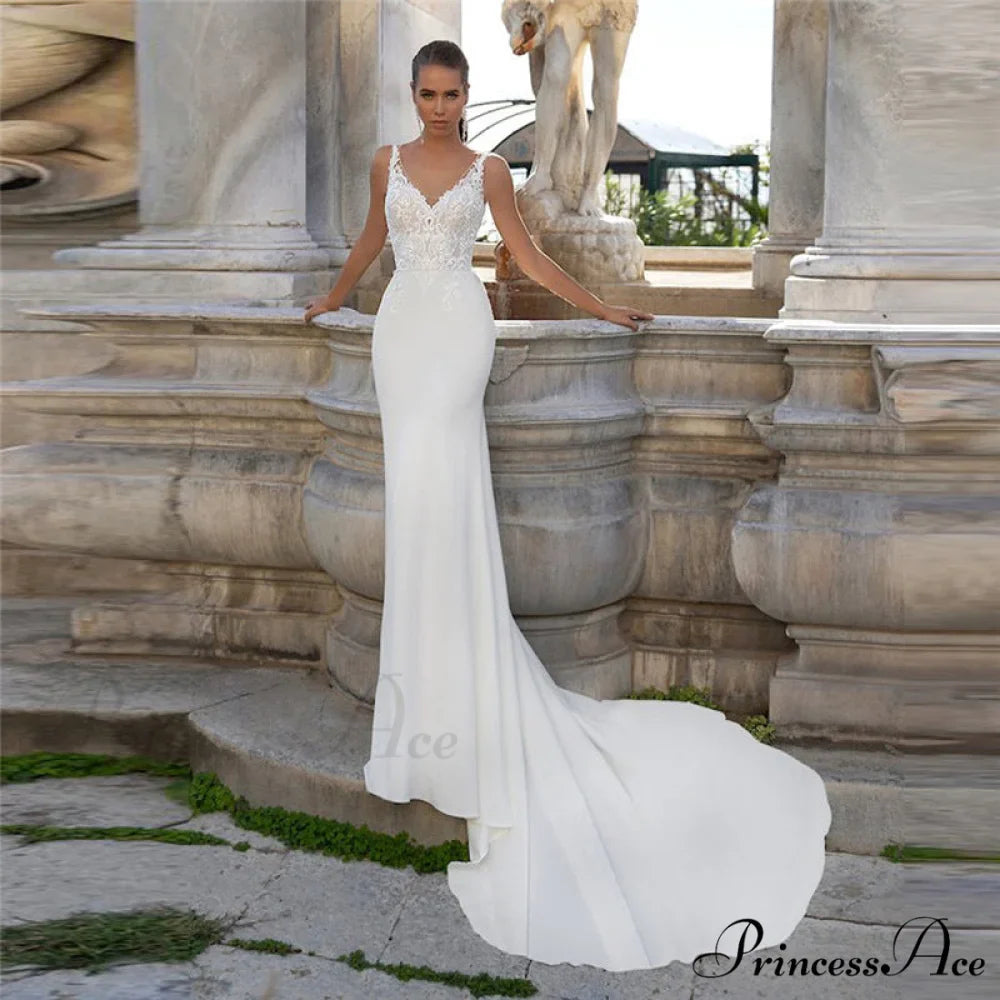 Free-spirited Plunging Neckline Lace Bridal Gown