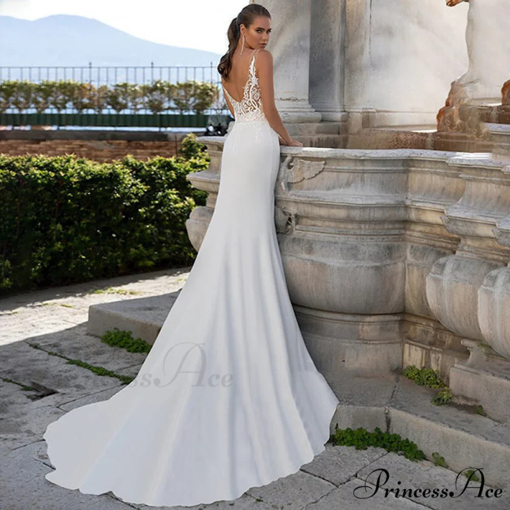 Free-spirited Plunging Neckline Lace Bridal Gown