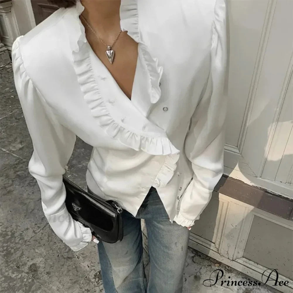 Frilled Ivory Extended Sleeve Top