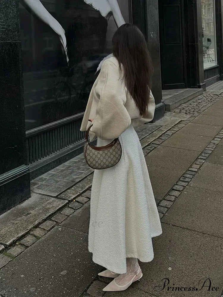 Ivory Extended Sleeve Woolen Overcoat