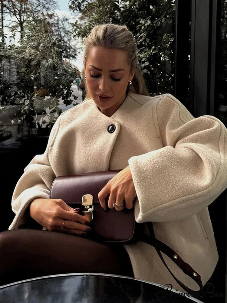 Ivory Extended Sleeve Woolen Overcoat