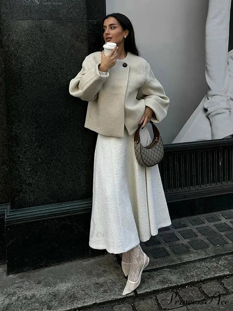 Ivory Extended Sleeve Woolen Overcoat