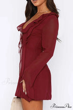 Long Sleeved Ruffled Mini Dress with Lace Up Detail