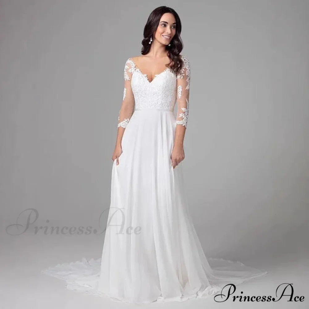 Low Plunging Neckline Extended Sleeve Nighttime Marriage Gown