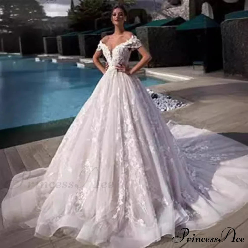 Off-Shoulder Majestic Elegance Wedding Gown