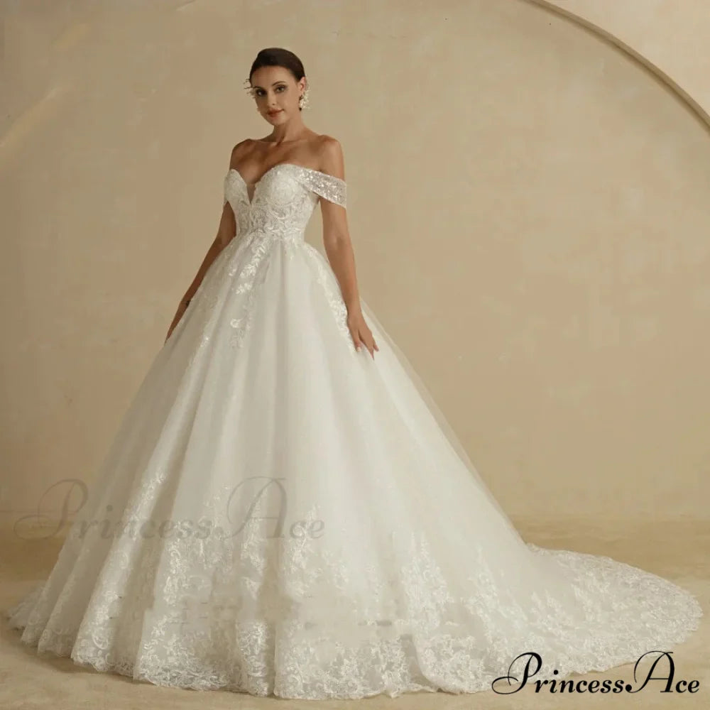 Off-Shoulder Majestic Elegance Wedding Gown