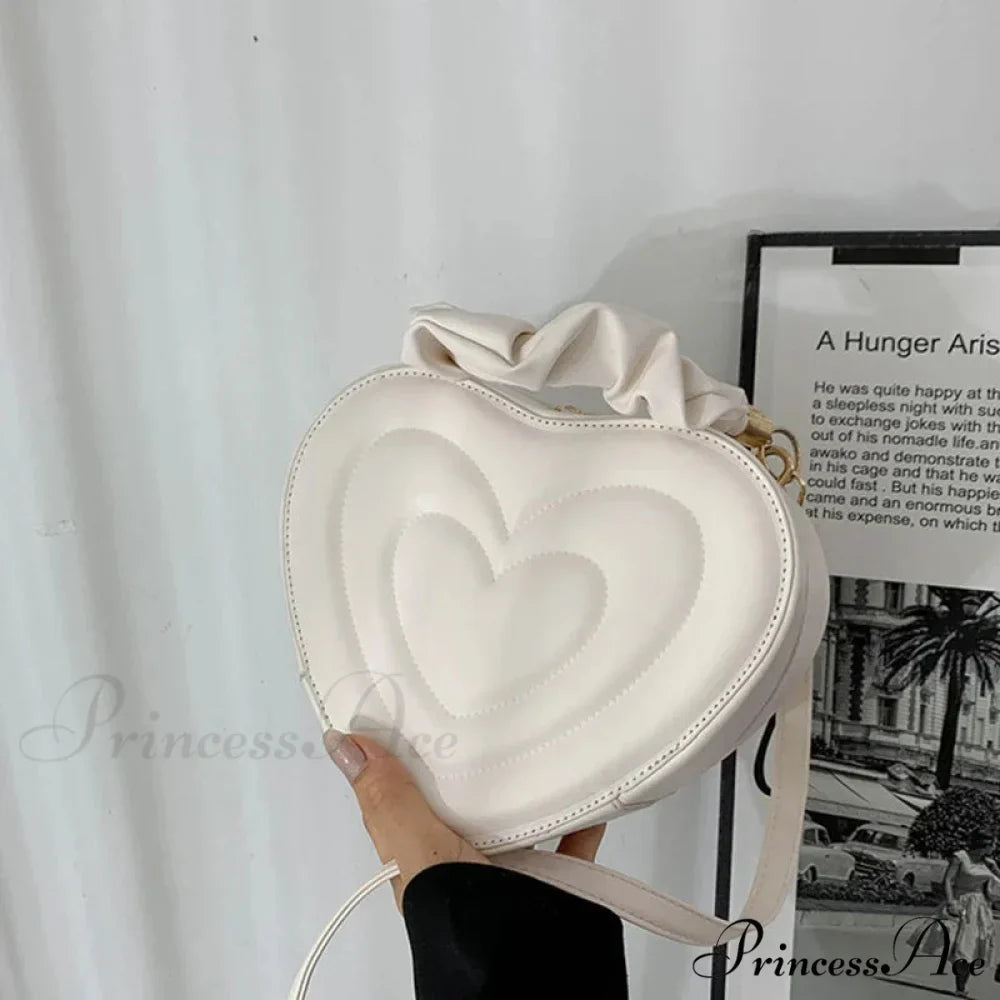Opulent Quilted Faux Leather Heart Crossbody