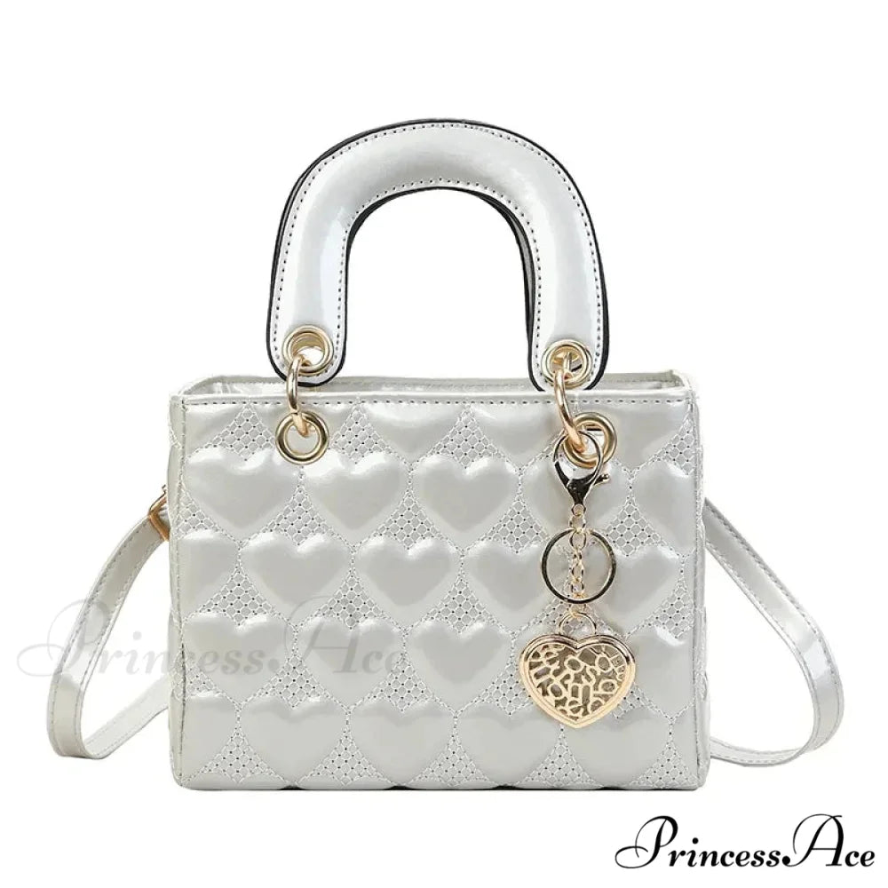 Opulent Quilted Square Handle Crossbody Purse