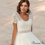 Pale Transparent Rear Seashore Wedding Gown