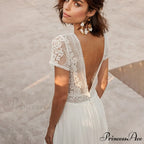 Pale Transparent Rear Seashore Wedding Gown