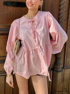 Patterned Baggy Lace-Up Circular Neck Blouse