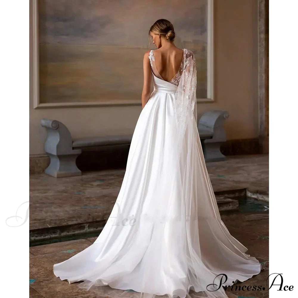 Profound Plunging Neckline Extended Tail Bridal Gown