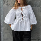 Puff Brief Sleeve Peplum Bind Front Blouse