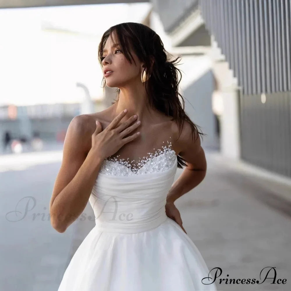 Sleeveless Charming Lace Extended Trail Bridal Gown