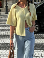 Sleeveless Circular Neck Button-Up Cardigan