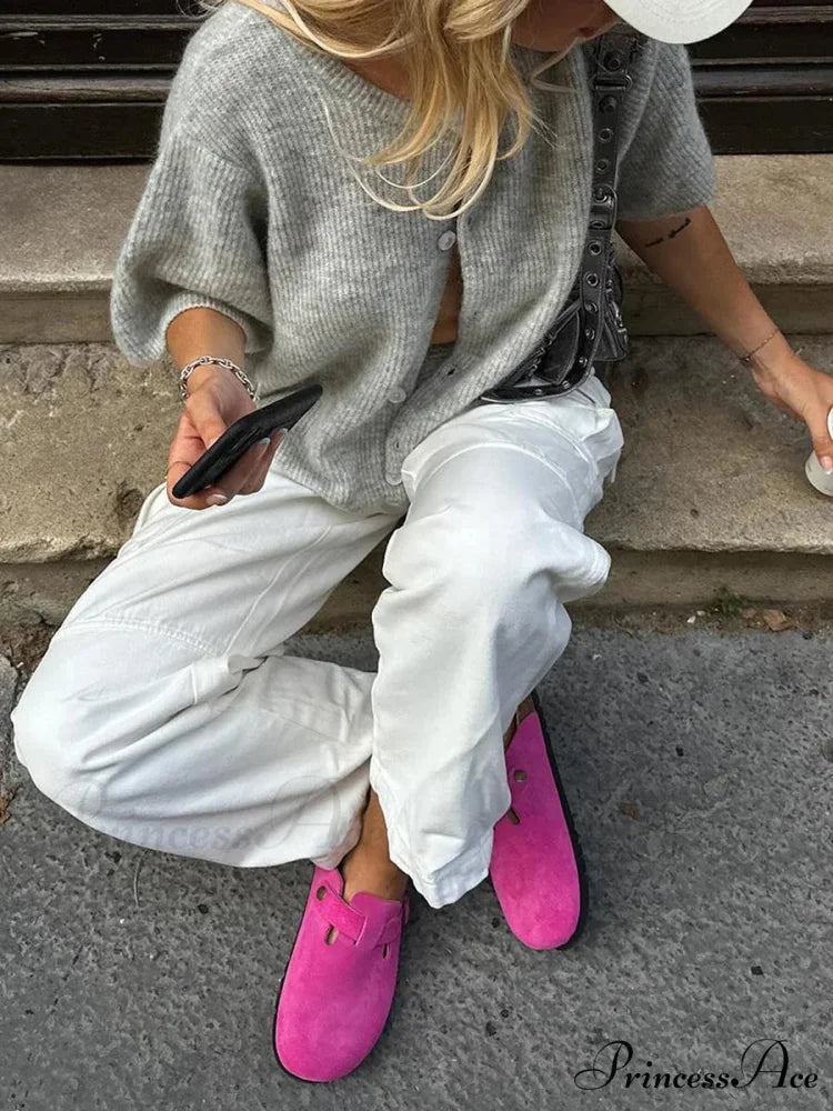 Sleeveless Circular Neck Button-Up Cardigan