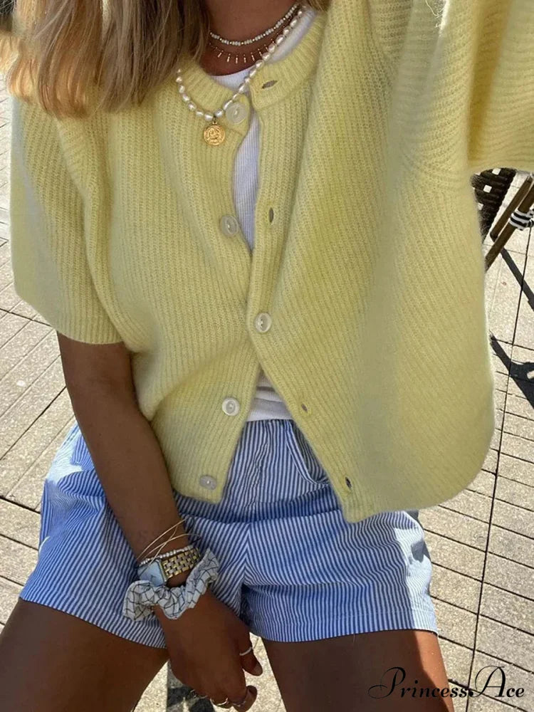 Sleeveless Circular Neck Button-Up Cardigan