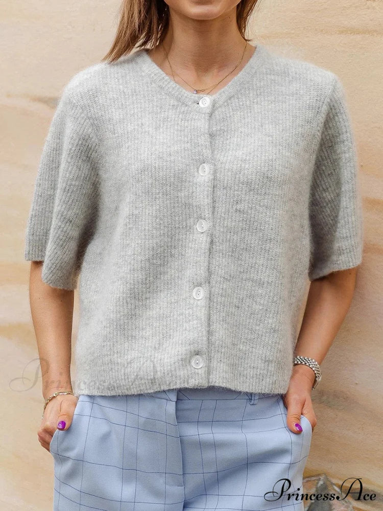 Sleeveless Circular Neck Button-Up Cardigan