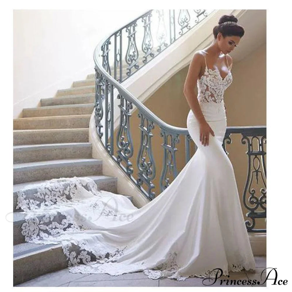 Sleeveless Plunging Neckline Extended Tail Bridal Gown