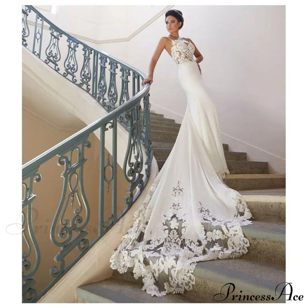 Sleeveless Plunging Neckline Extended Tail Bridal Gown