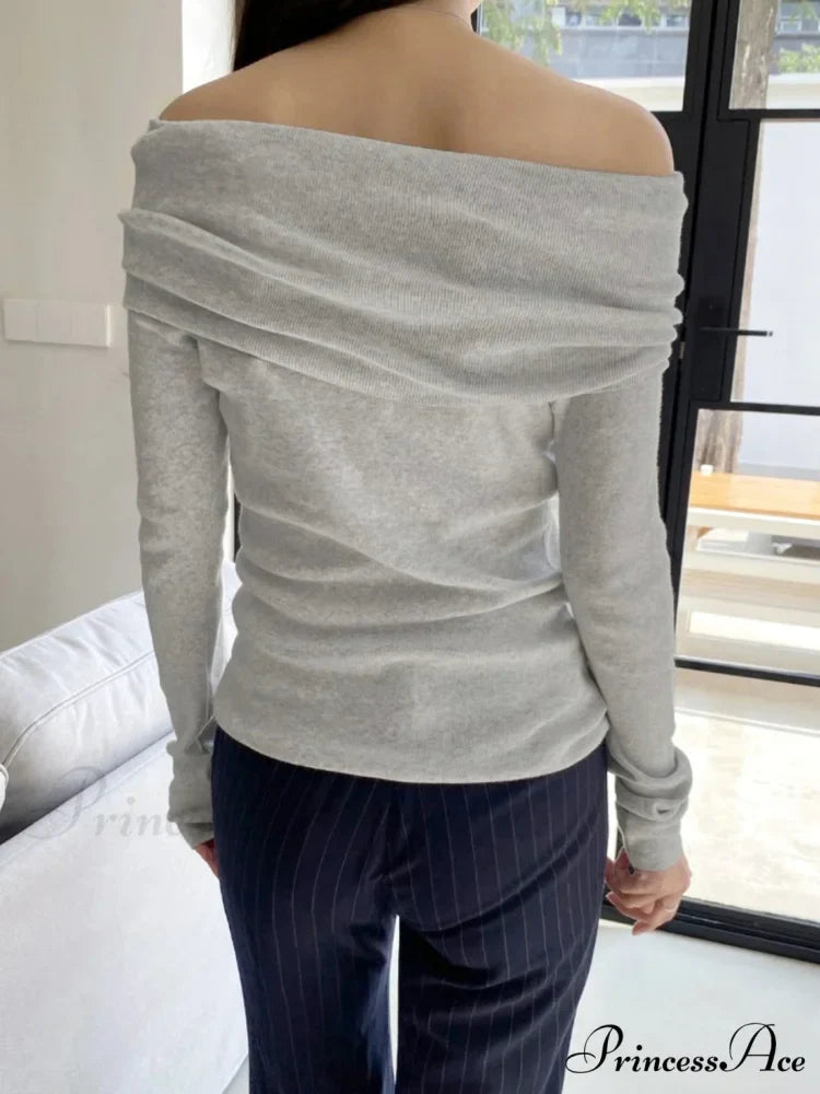 Slender Off-Shoulder Monochrome Slash Neck Extended Sleeve Knit Top