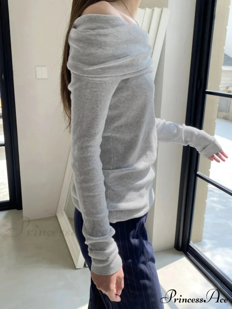 Slender Off-Shoulder Monochrome Slash Neck Extended Sleeve Knit Top