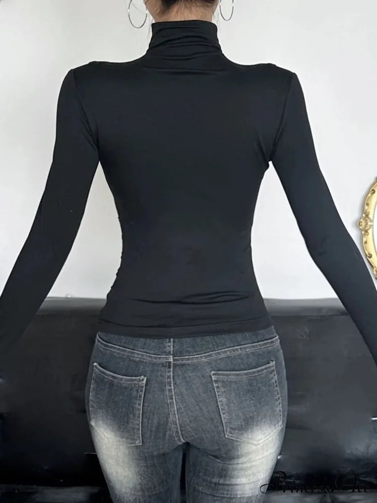 Slender Pierced Turtleneck Uniform Long Sleeve Knit Top