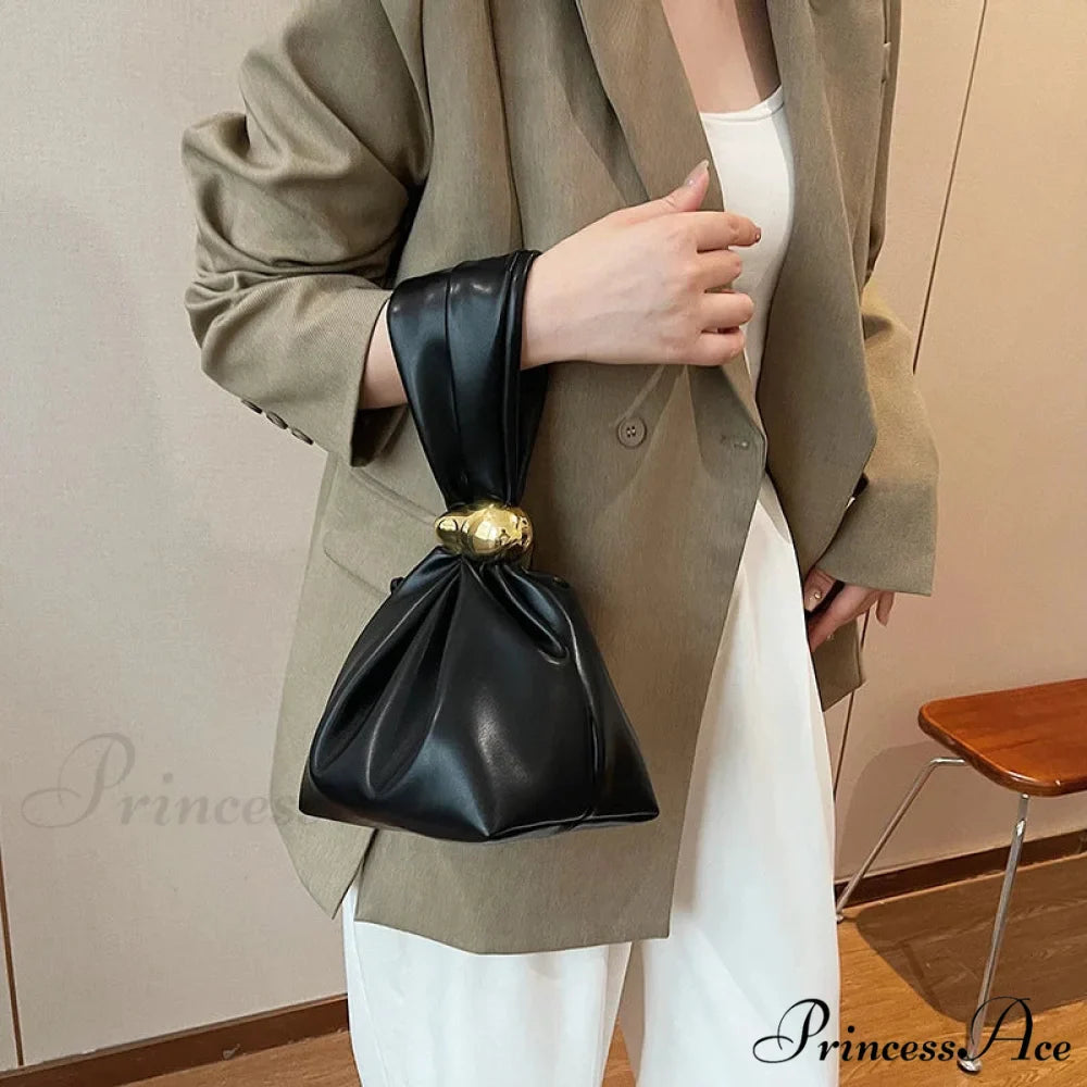 Small Dumpling Faux Leather Clutch Wristlet