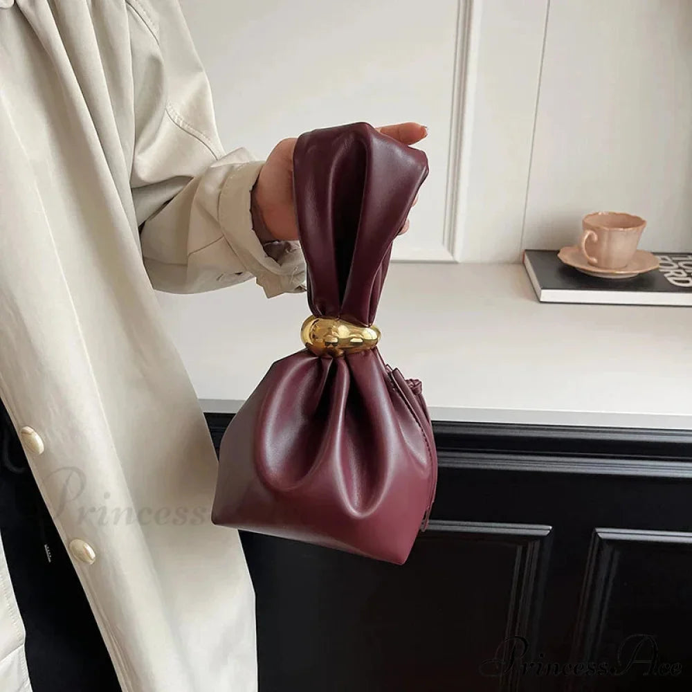 Small Dumpling Faux Leather Clutch Wristlet