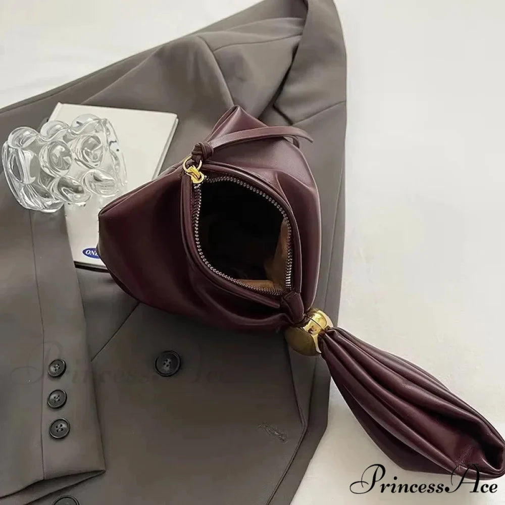 Small Dumpling Faux Leather Clutch Wristlet