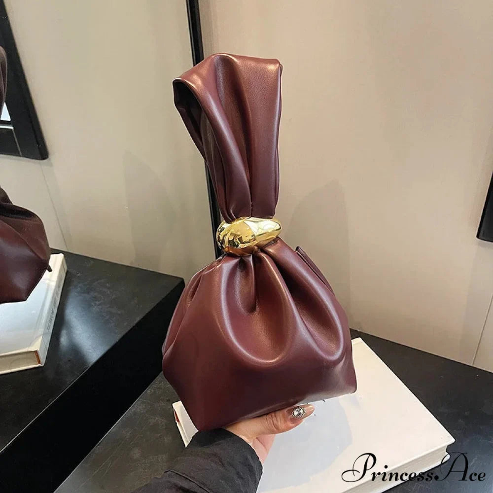 Small Dumpling Faux Leather Clutch Wristlet