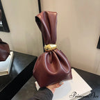 Small Dumpling Faux Leather Clutch Wristlet